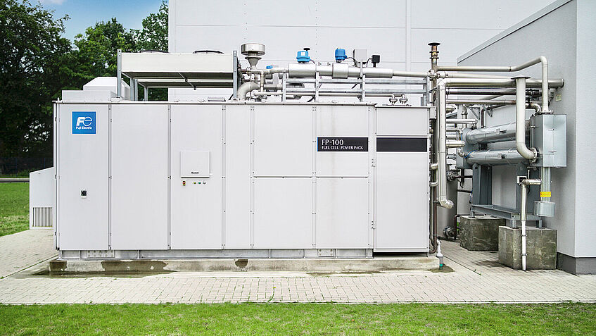 Die Brennstoffzellenanalge vor dem VitaCube Die Brennstoffzellenanalge vor dem VitaCube