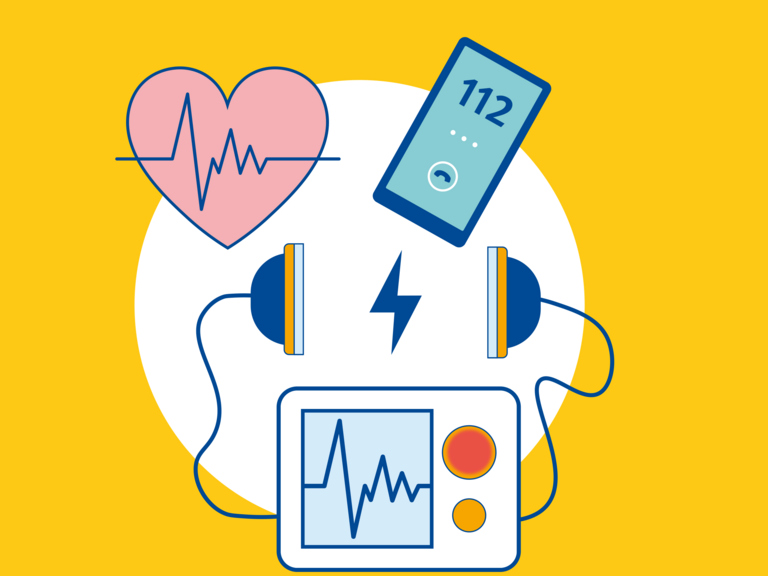 Ein Defibrillator, ein Herz und ein Handy, das die Notrufnummer 112 anzeigt.